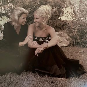 Beautiful timeless black gown. Gorgeous rose beaded detail. Originally $$700